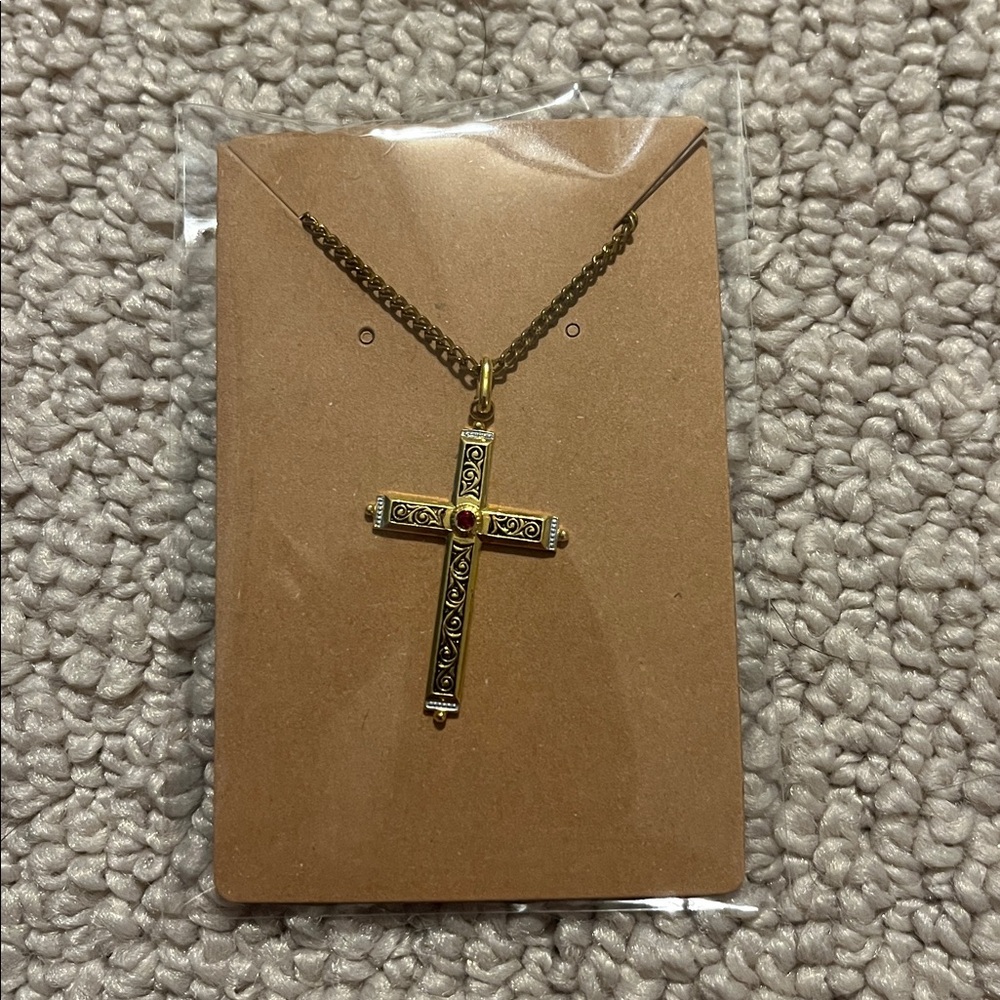 Ornate Gold Cross Necklace with Red Gem